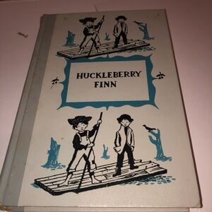 Adventures of Huckleberry Finn by Mark Twain- junior deluxe edition-used